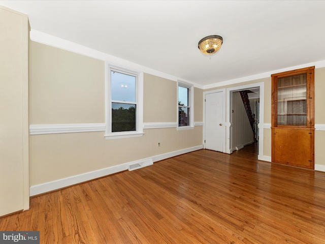 21 E D St, Brunswick, MD 21716 - spare room with wood finished floors and baseboards