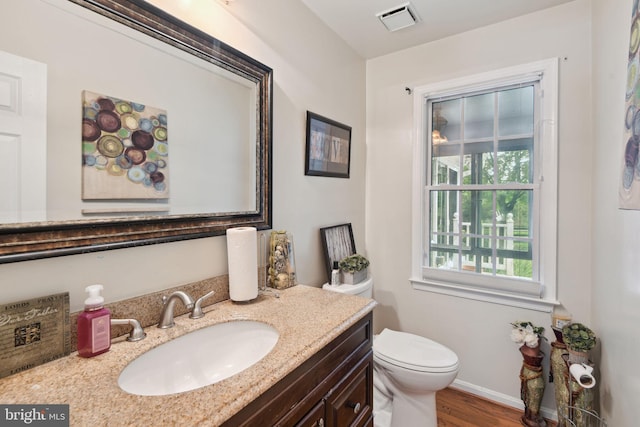 15118 Briarcliff Manor Way, Burtonsville, MD 20866 - half bathroom featuring vanity and wood finished floors