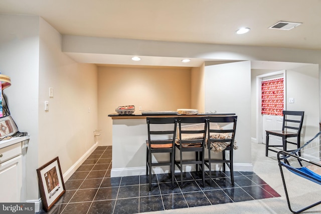 15118 Briarcliff Manor Way, Burtonsville, MD 20866 - bar with recessed lighting and dark tile patterned floors