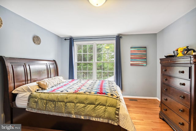15118 Briarcliff Manor Way, Burtonsville, MD 20866 - bedroom featuring light wood-style floors and baseboards