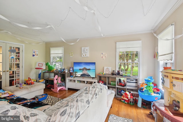 15118 Briarcliff Manor Way, Burtonsville, MD 20866 - living room featuring wood finished floors and ornamental molding