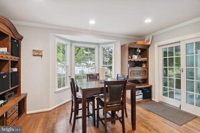 15118 Briarcliff Manor Way, Burtonsville, MD 20866 - dining area with light wood-type flooring and ornamental molding