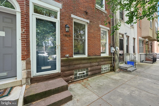 1810 Francis St, Philadelphia, PA 19130 - view of exterior entry featuring brick siding and a porch