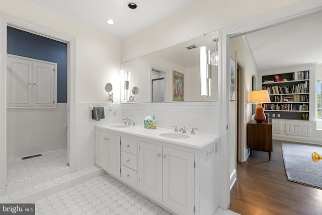22693 St Louis Rd, Middleburg, VA 20117 - bathroom with double vanity, a stall shower, and recessed lighting