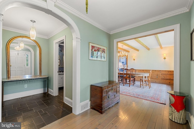 22693 St Louis Rd, Middleburg, VA 20117 - hallway with arched walkways, a chandelier, crown molding, baseboards, and dark wood-style floors