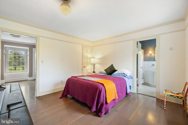 22693 St Louis Rd, Middleburg, VA 20117 - bedroom featuring wood-type flooring, baseboards, connected bathroom, and crown molding
