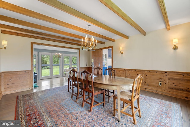 22693 St Louis Rd, Middleburg, VA 20117 - dining room featuring a wainscoted wall, beamed ceiling, a chandelier, hardwood / wood-style flooring, and french doors