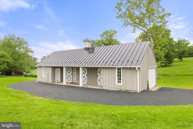 22693 St Louis Rd, Middleburg, VA 20117 - rear view of property with a lawn, an outbuilding, and a garage