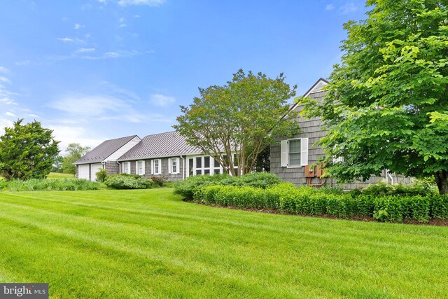 22693 St Louis Rd, Middleburg, VA 20117 - view of front of property with a front lawn, metal roof, and a standing seam roof