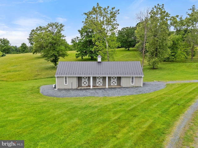 22693 St Louis Rd, Middleburg, VA 20117 - view of front of property with a front yard, metal roof, a barn, an outdoor structure, and view of scattered trees