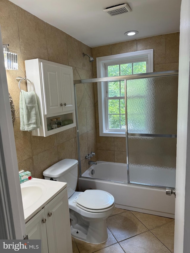 5104 Columbia Pike Unit 6, Arlington, VA 22204 - full bathroom with vanity, combined bath / shower with glass door, tile walls, and tile patterned flooring
