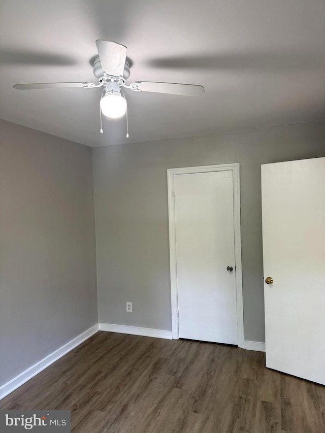 5104 Columbia Pike Unit 6, Arlington, VA 22204 - unfurnished bedroom featuring wood finished floors and a ceiling fan
