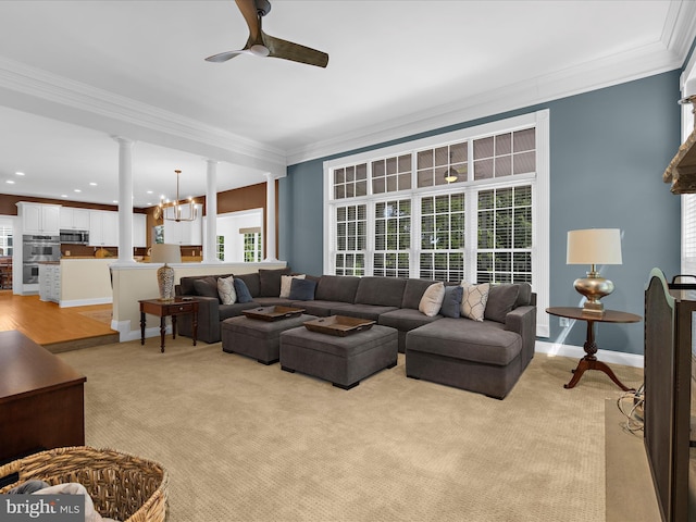 116 Colony Xing, Edgewater, MD 21037 - living room featuring decorative columns, a ceiling fan, ornamental molding, light carpet, and baseboards