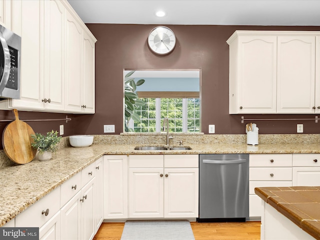 116 Colony Xing, Edgewater, MD 21037 - kitchen with appliances with stainless steel finishes, a sink, white cabinetry, light wood-type flooring, and recessed lighting