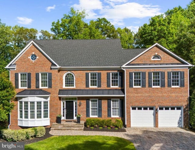 116 Colony Xing, Edgewater, MD 21037 - colonial home with driveway, an attached garage, and brick siding