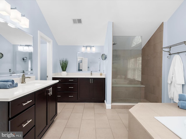 116 Colony Xing, Edgewater, MD 21037 - full bathroom with a shower stall, two vanities, tile patterned floors, vaulted ceiling, and a bath