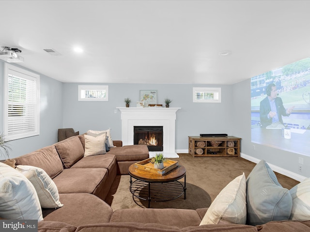 116 Colony Xing, Edgewater, MD 21037 - living room featuring a glass covered fireplace, carpet floors, and baseboards