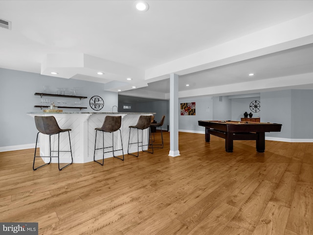 116 Colony Xing, Edgewater, MD 21037 - kitchen featuring recessed lighting, a kitchen bar, billiards, light stone counters, and baseboards