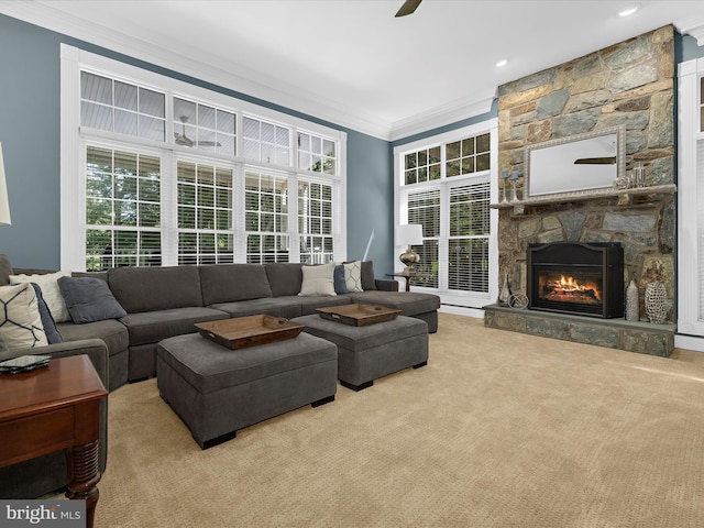 116 Colony Xing, Edgewater, MD 21037 - living room featuring ornamental molding, carpet, a stone fireplace, and ceiling fan