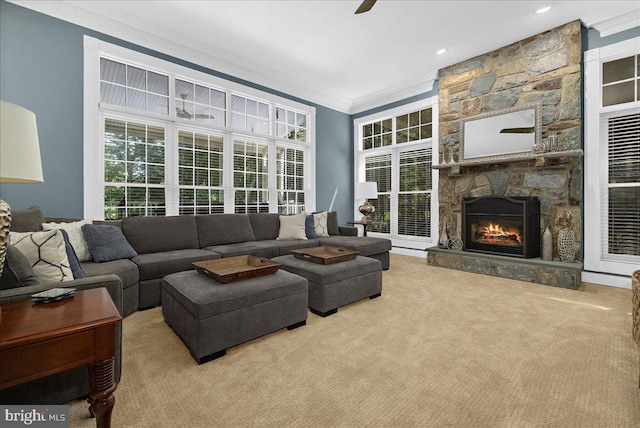116 Colony Xing, Edgewater, MD 21037 - living area featuring carpet flooring, ornamental molding, a fireplace, healthy amount of natural light, and ceiling fan
