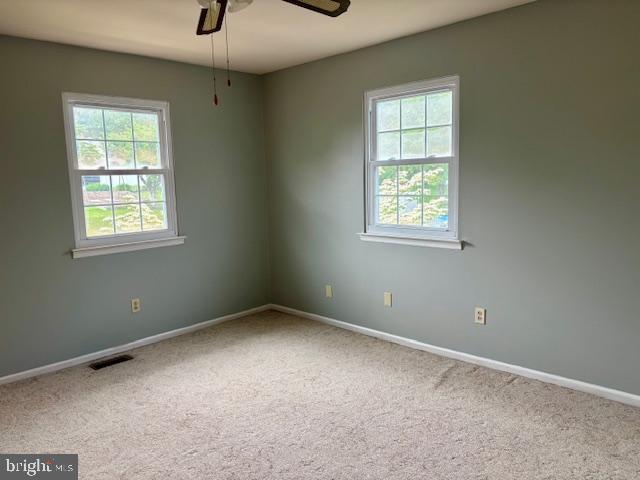 132 Popodickon Dr, Boyertown, PA 19512 - empty room featuring baseboards, a ceiling fan, and carpet floors