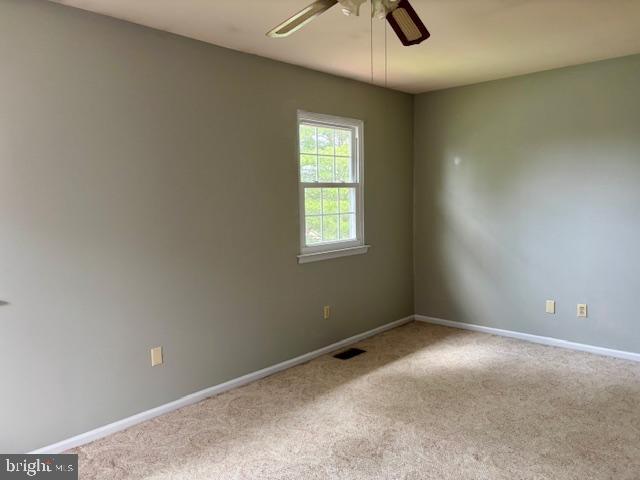 132 Popodickon Dr, Boyertown, PA 19512 - unfurnished room with a ceiling fan, carpet floors, and baseboards