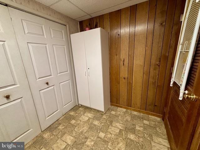 132 Popodickon Dr, Boyertown, PA 19512 - unfurnished bedroom with wood walls and a paneled ceiling