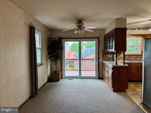 132 Popodickon Dr, Boyertown, PA 19512 - kitchen featuring a ceiling fan, freestanding refrigerator, healthy amount of natural light, and light colored carpet
