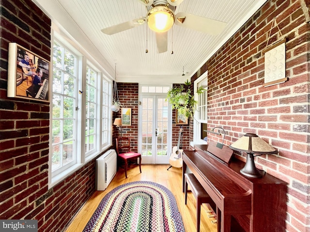 402 W Masonic View Ave, Alexandria, VA 22301 - sunroom featuring french doors, brick wall, healthy amount of natural light, wood finished floors, and wooden ceiling