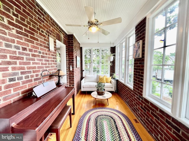 402 W Masonic View Ave, Alexandria, VA 22301 - sunroom / solarium featuring brick wall, plenty of natural light, wood finished floors, and ornamental molding