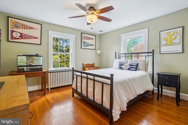 402 W Masonic View Ave, Alexandria, VA 22301 - bedroom with radiator, wood-type flooring, and baseboards