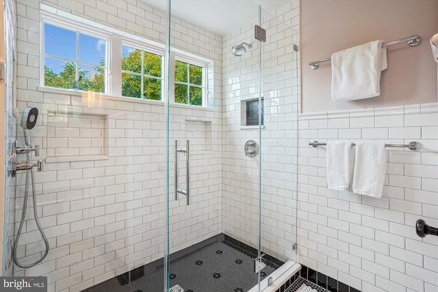 402 W Masonic View Ave, Alexandria, VA 22301 - bathroom featuring a shower stall and tile walls