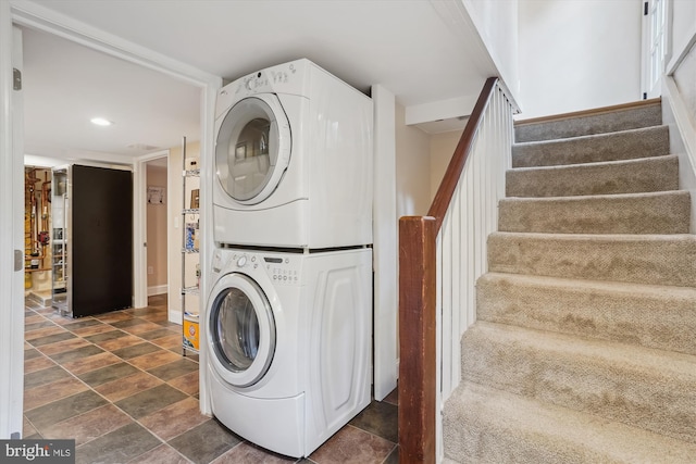 402 W Masonic View Ave, Alexandria, VA 22301 - laundry area with stacked washer and clothes dryer, recessed lighting, and baseboards
