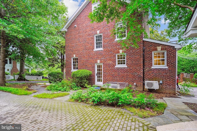 402 W Masonic View Ave, Alexandria, VA 22301 - view of property exterior featuring brick siding and a cooling unit