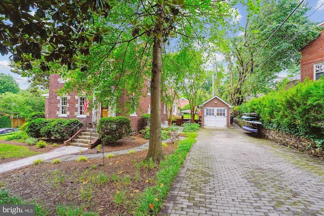 402 W Masonic View Ave, Alexandria, VA 22301 - view of front facade with an outbuilding and brick siding