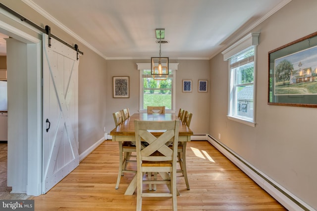 1606 Jeffers Rd, Baltimore, MD 21204 - dining room featuring baseboard heating, light wood finished floors, a barn door, ornamental molding, and baseboards