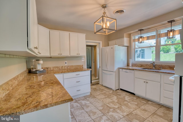 1606 Jeffers Rd, Baltimore, MD 21204 - kitchen with white appliances, a sink, a chandelier, white cabinetry, and decorative light fixtures