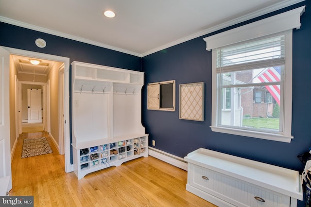 1606 Jeffers Rd, Baltimore, MD 21204 - mudroom with baseboard heating, attic access, light wood-type flooring, ornamental molding, and baseboards