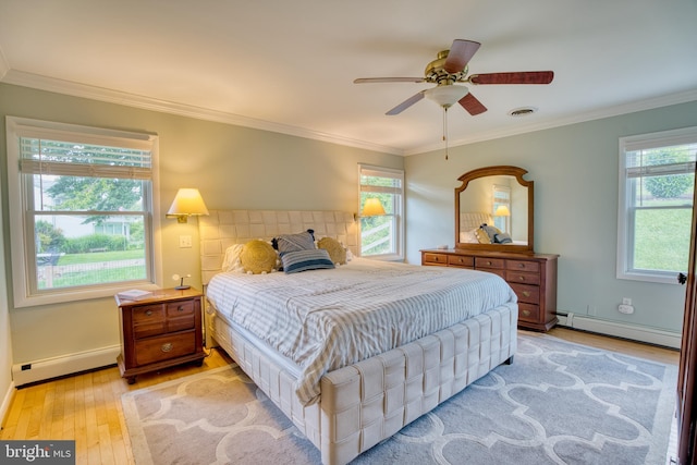 1606 Jeffers Rd, Baltimore, MD 21204 - bedroom with baseboard heating, light wood-type flooring, crown molding, baseboards, and ceiling fan