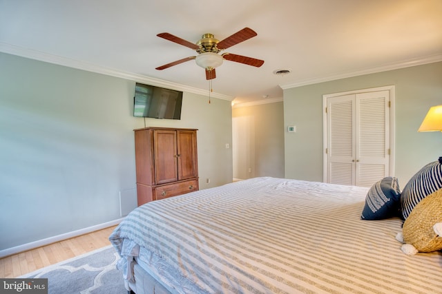 1606 Jeffers Rd, Baltimore, MD 21204 - bedroom featuring a closet, light wood finished floors, crown molding, baseboards, and ceiling fan