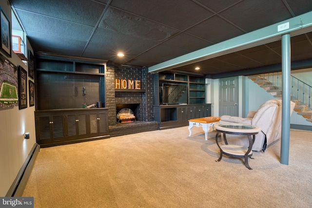 1606 Jeffers Rd, Baltimore, MD 21204 - living room with a baseboard radiator, carpet flooring, a fireplace, and stairway