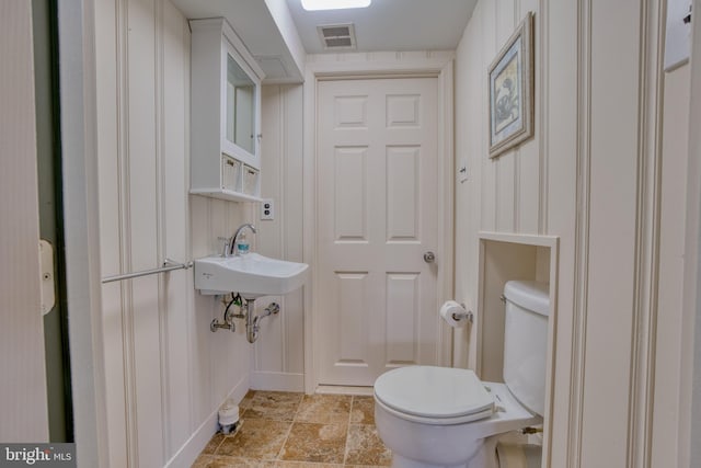 1606 Jeffers Rd, Baltimore, MD 21204 - half bathroom featuring toilet and a sink