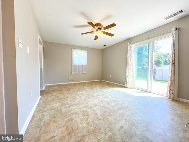 131 Arundel Rd, Pasadena, MD 21122 - spare room with a ceiling fan and baseboards