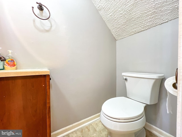 131 Arundel Rd, Pasadena, MD 21122 - half bathroom with lofted ceiling, baseboards, a textured ceiling, and toilet