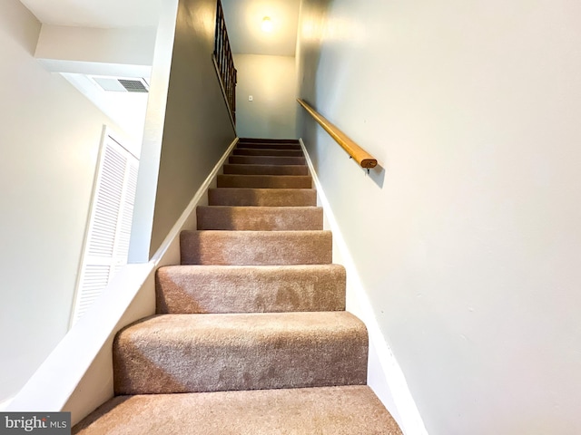 131 Arundel Rd, Pasadena, MD 21122 - staircase featuring carpet floors