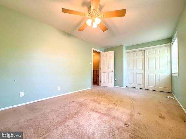 131 Arundel Rd, Pasadena, MD 21122 - unfurnished bedroom featuring carpet floors, baseboards, a closet, and ceiling fan