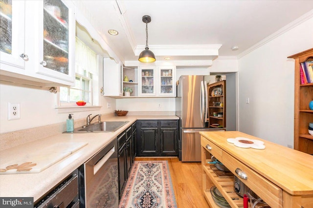 4117 Charley Forest St, Olney, MD 20832 - kitchen with stainless steel appliances, ornamental molding, white cabinetry, light wood-type flooring, and open shelves