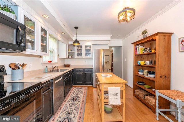 4117 Charley Forest St, Olney, MD 20832 - kitchen with black appliances, open shelves, light wood-style floors, a sink, and ornamental molding