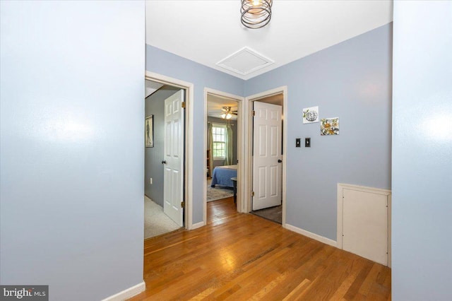 4117 Charley Forest St, Olney, MD 20832 - hallway featuring attic access, wood finished floors, and baseboards