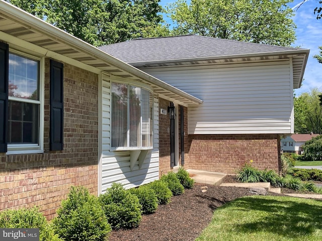 4117 Charley Forest St, Olney, MD 20832 - view of side of property featuring brick siding and a shingled roof